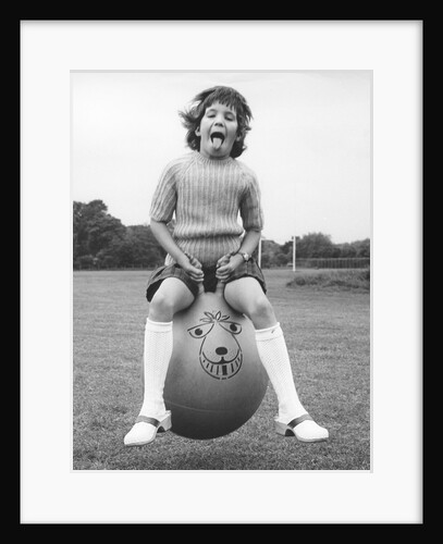 Girl on a space hopper, 1970s by Tony Boxall