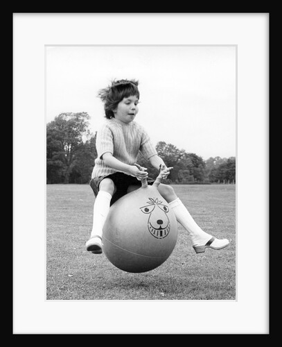 Girl on a space hopper, 1970s by Tony Boxall