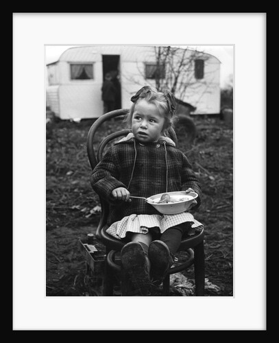 Gipsy girl eating, Lewes, Sussex, 1964 by Tony Boxall