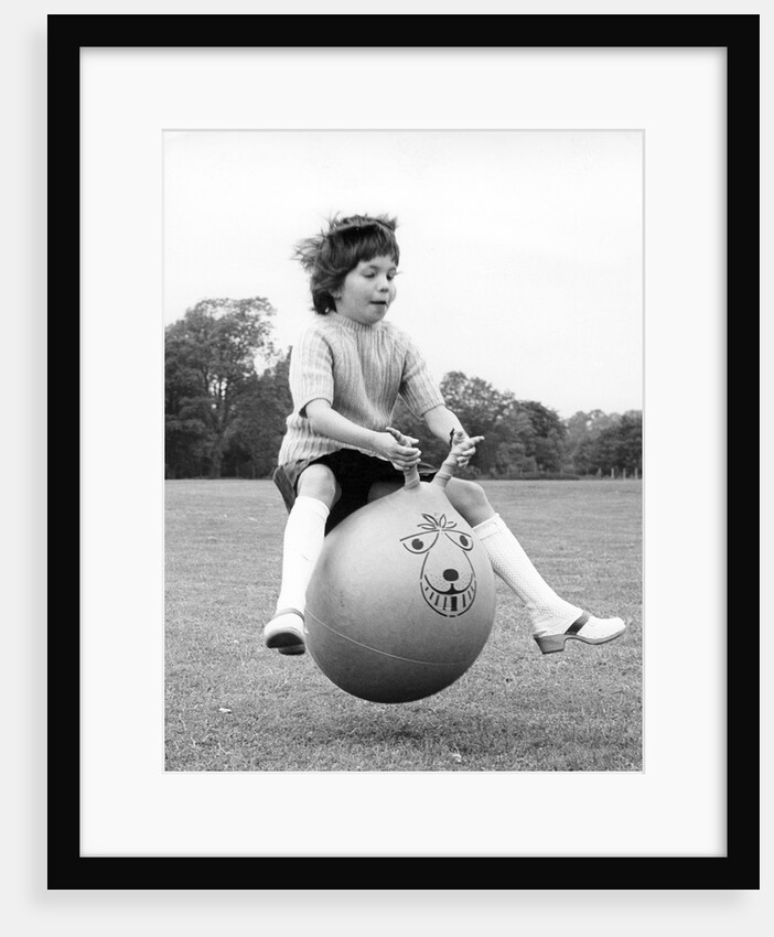 Girl on a space hopper, 1970s by Tony Boxall