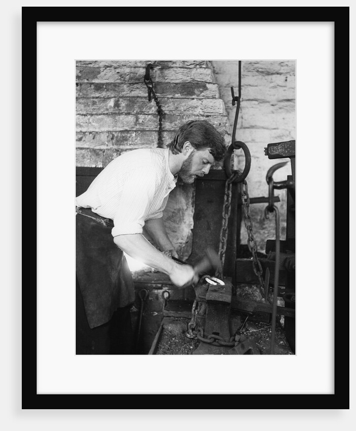 Black Country Museum, Birmingham, West Midlands, 1986 A blacksmith at work in a smithy by Tony Boxall