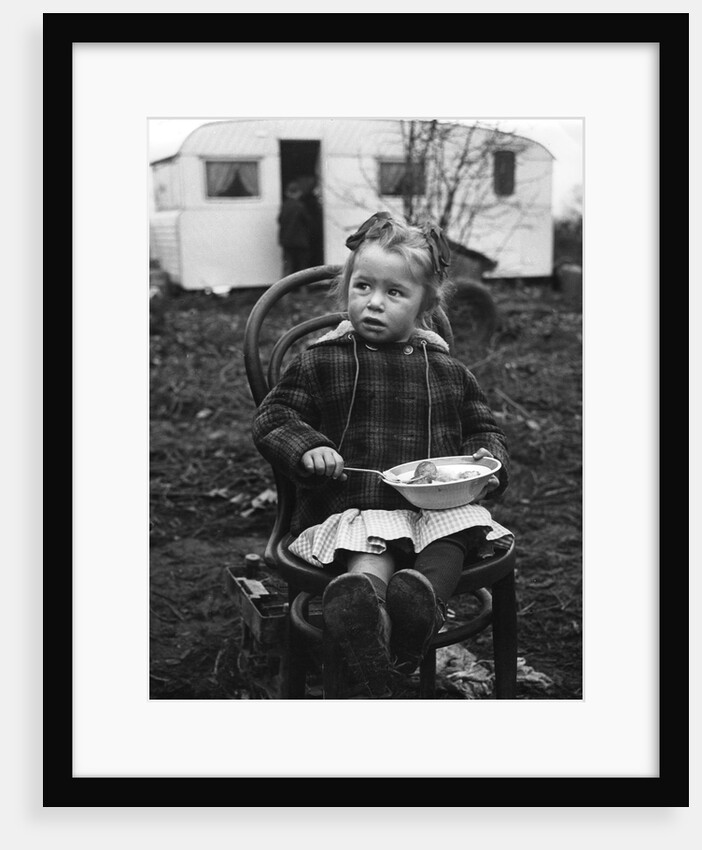 Gipsy girl eating, Lewes, Sussex, 1964 by Tony Boxall