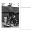 Travelling gipsy family re-housed in a bungalow, Beare Green, Surrey, 1964 by Tony Boxall