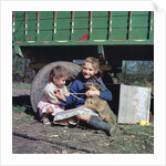 Two young gipsy girls playing with a dog, Charlwood, Newdigate area, Surrey, 1964 by Tony Boxall