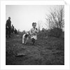 Gipsy child with a puppy, Lewes, Sussex, 1963 by Tony Boxall