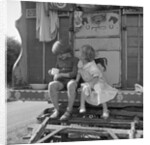 Children sitting on the steps of a gipsy caravan, Outwood, Surrey, 1963 by Tony Boxall