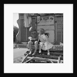 Children sitting on the steps of a gipsy caravan, Outwood, Surrey, 1963 by Tony Boxall