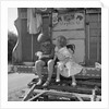 Children sitting on the steps of a gipsy caravan, Outwood, Surrey, 1963 by Tony Boxall