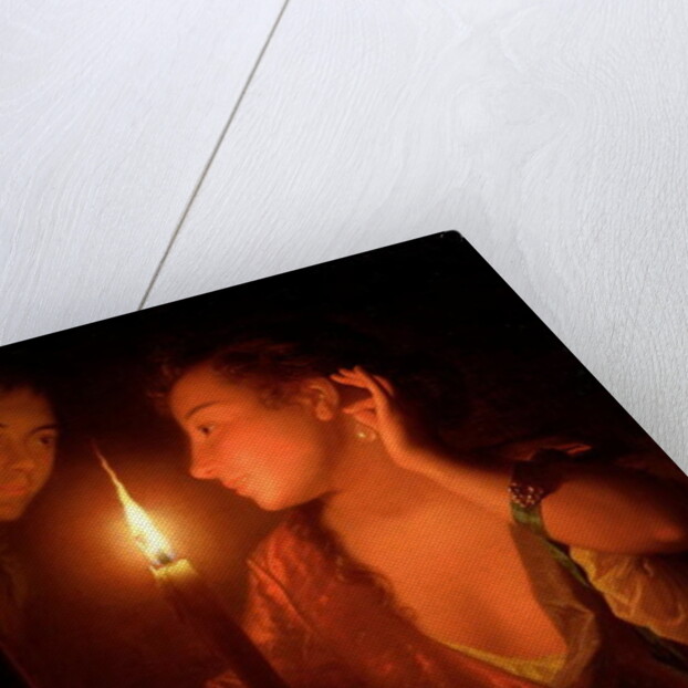 A Lady Admiring An Earring by Candlelight by Godfried Schalcken
