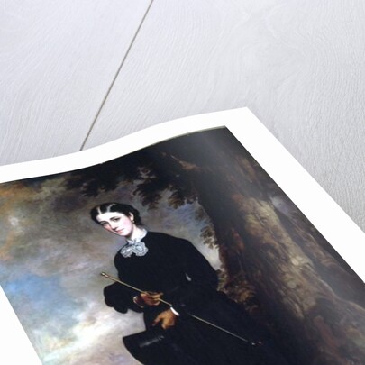 Young woman wearing a black riding habit and standing in a landscape by Francis Grant