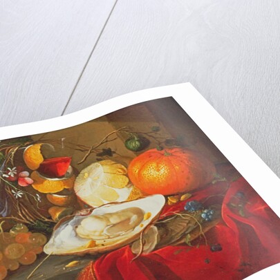 An oyster, a glass of wine and fruit on a table covered with a red velvet drape by Elias van den Broeck