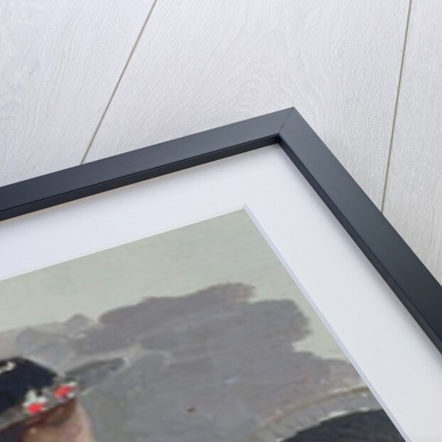 Woman in a blue dress and wide brimmed hat sitting upon rocks by Harry Watson