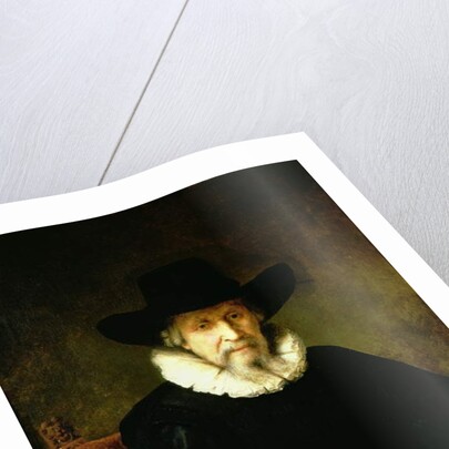 Portrait of a Gentleman wearing a ruff and dark clothes with a wide brimmed hat by Ferdinand Bol