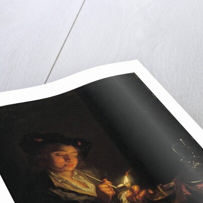 A candlelit interior with a young man seated at a table, lighting his pipe by Arnold Boonen