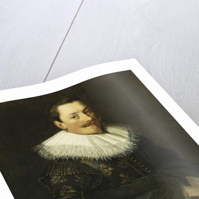 Portrait of a Gentleman, Standing half length, Wearing a Blue Costume with Gold Embroidery and a White Lace Collar by Paulus Moreelse