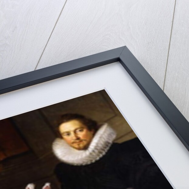 A group Portrait of a Family, full-length, in an interior by Adam van Noort