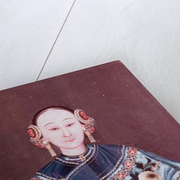 Chinese woman in traditional costume holding a single flower by School Chinese