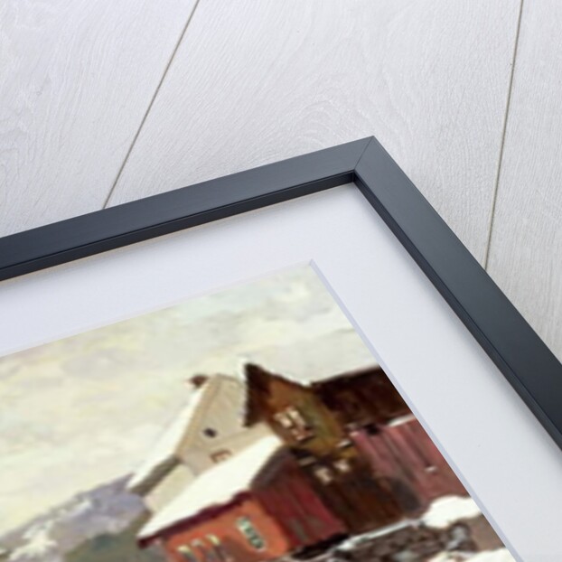 Snow-covered buildings by a river by Fritz Thaulow