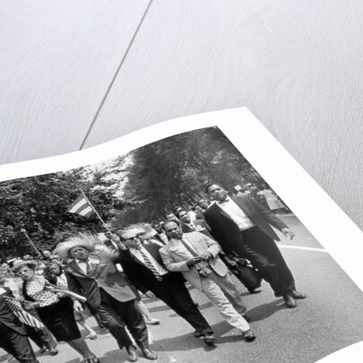 The March on Washington: Marchers Wearing Hats Carry Puerto Rican Flags Down Constitution Avenue, 29th August 1963 by Nat Herz