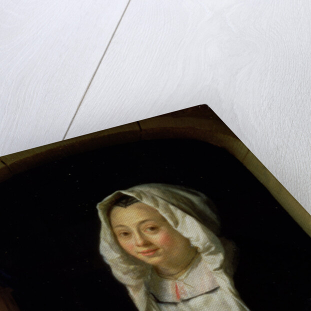 Portrait of a maid holding a waffle by Godfried Schalcken