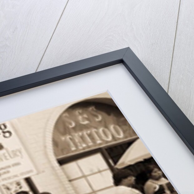 Police gathered behind a 'Help Wanted' sign, 2004 by Stephen Spiller