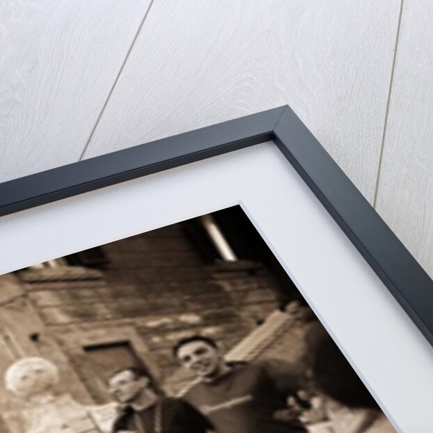 Man with spiked hair smoking and drinking, 2004 by Stephen Spiller