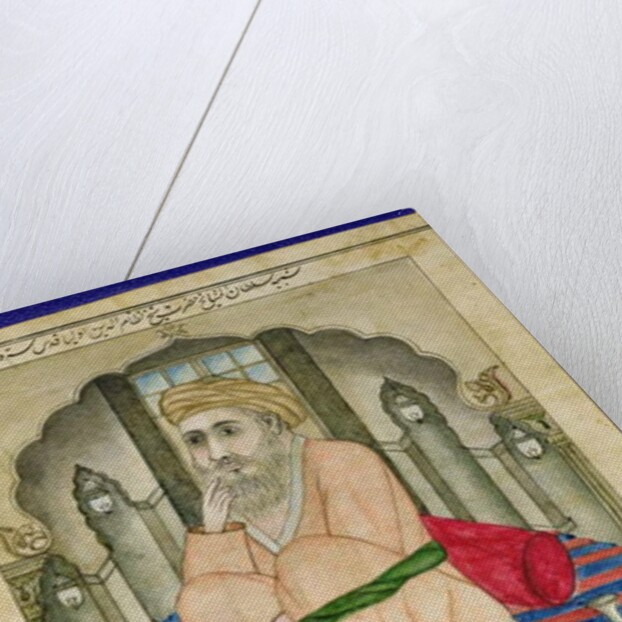 A Sufi sage seated in a niche, from an album of miniatures in Persian style with Deccan text by Indian School