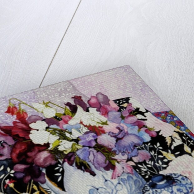 Sweet peas in a blue and white jug with blue and white pot and textiles by Joan Thewsey