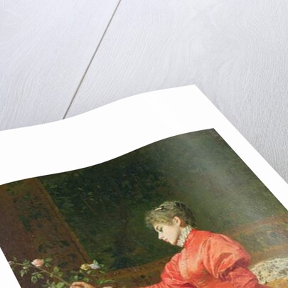 Woman arranging a vase of flowers by Alfonso Savini