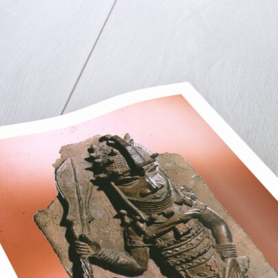 Plaque depicting the royal god Oba holding the eben sword in his right hand, dancing to honour his ancestors, Benin, possibly 16th century by Anonymous