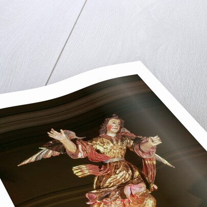 An angel above the altarpiece of the Chapel of St. Joseph by Mexican School