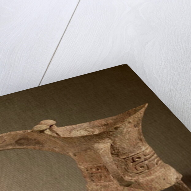 Three-legged 'chueh' vessel for heating wine with a taotie design by School Chinese