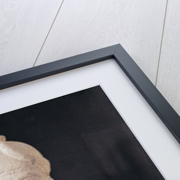 Statuette of a man carrying a box by Assyrian