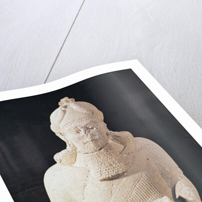 Statuette of a man carrying a box by Assyrian