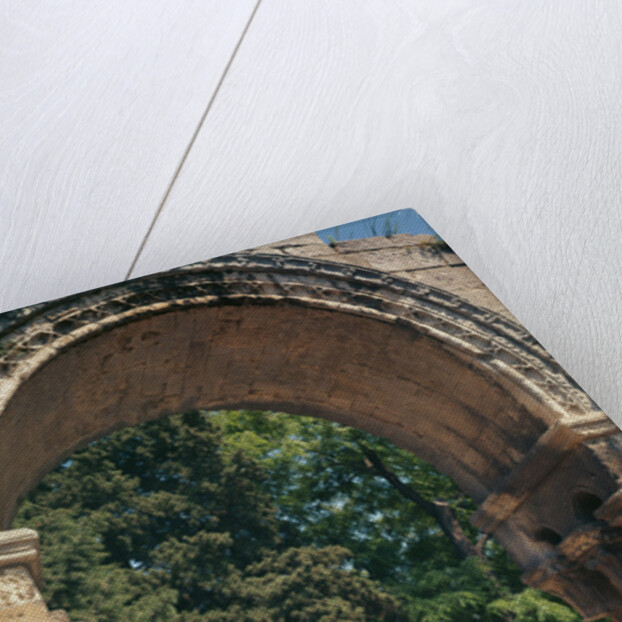 View of the Allee de Sarcophages through the remains of the entrance of the Church of St. Cesaire le Vieux by Anonymous