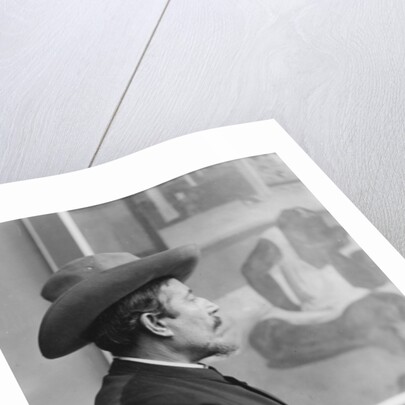 Paul Gauguin in front of his canvases, c.1893 by French Photographer