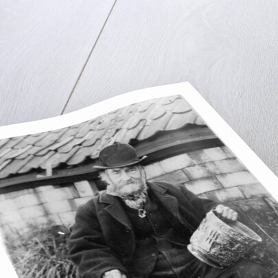 Edward Bingham holding one of his Castle Hedingham Ware designs by English Photographer