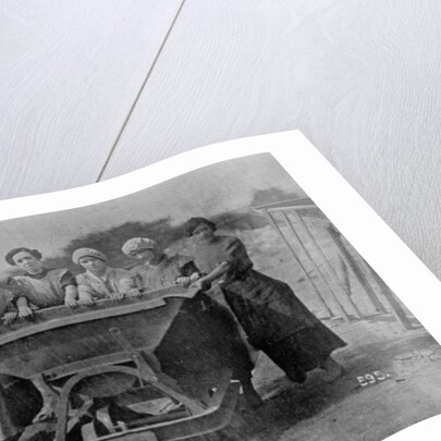 Women Transporting Refuse. War Office photography, 1916 by English Photographer