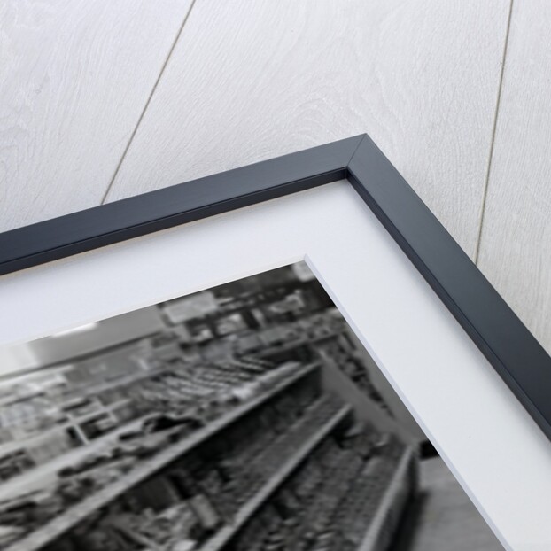 Paint and brushes aisle, Woolworths store, 1956 by English Photographer
