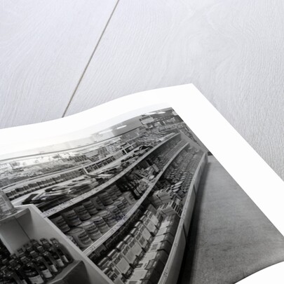 Paint and brushes aisle, Woolworths store, 1956 by English Photographer