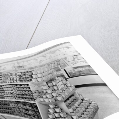 Tinned foods aisle, Woolworths store, 1956 by English Photographer