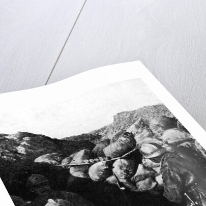 Enemies in the same trench during WWI, French and German soldiers seperated only by a wall of sandbags by French Photographer