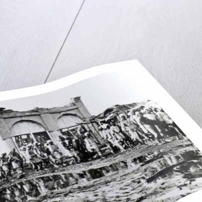 Prisoners passing the 'Mihrab,' the Khalifa's Prayer House, 1898 by English Photographer