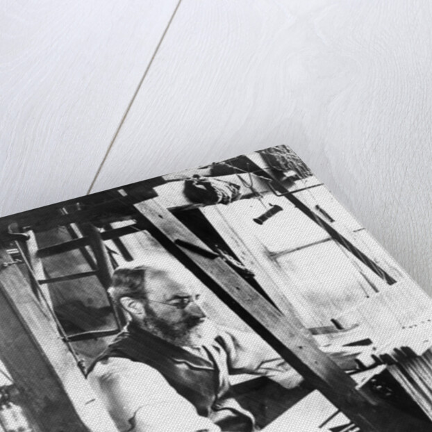 Man working at a handloom by English Photographer
