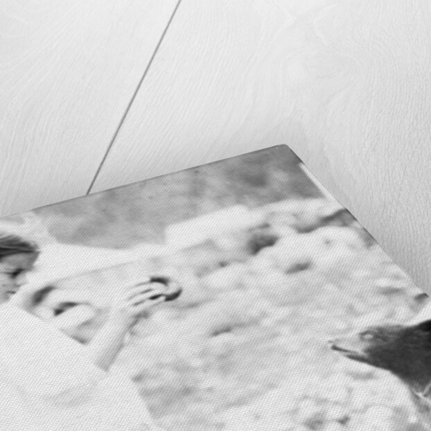 Girl and bear cub, c.1900-16 by Anonymous