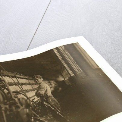 John Dempsey, 11 or 12 years old, Saturday worker in the mule-spinning room at Jackson Mill, Fiskeville, Rhode Island, 1909 by Lewis Wickes Hine