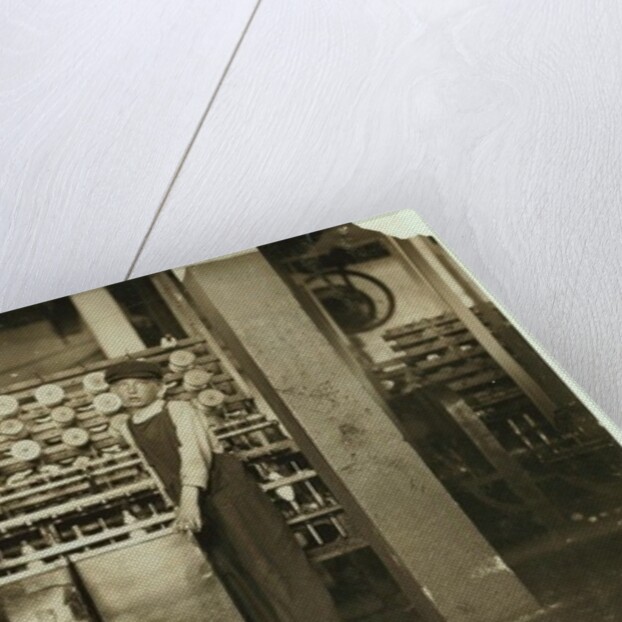12 year old doffer Ronald Webb and 7 year old Frank Robinson, son of cardroom boss, who sweeps and doffs at Roanoke Cotton Mills, Virginia, 1911 by Lewis Wickes Hine