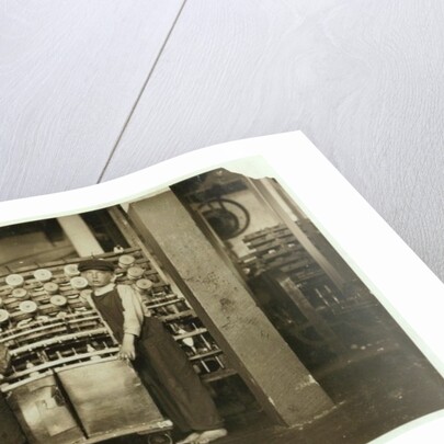 12 year old doffer Ronald Webb and 7 year old Frank Robinson, son of cardroom boss, who sweeps and doffs at Roanoke Cotton Mills, Virginia, 1911 by Lewis Wickes Hine