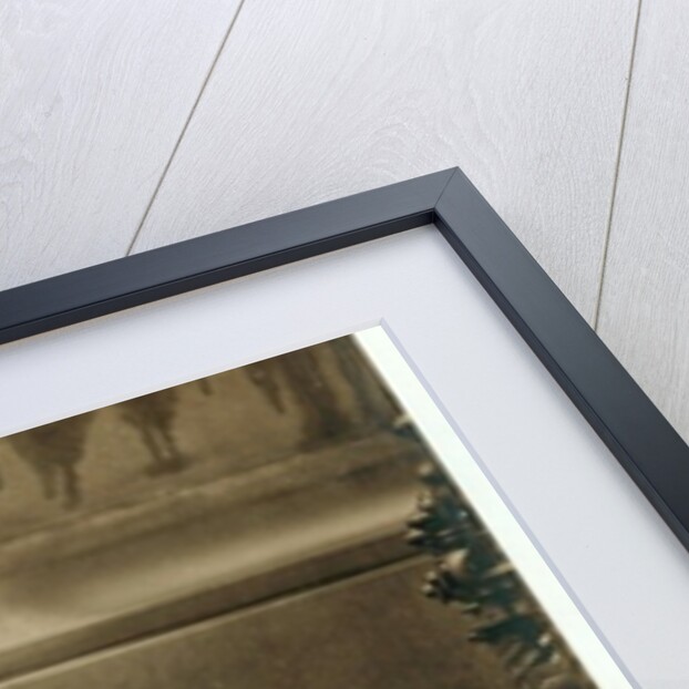 8 year old newsboy Michael McNelis, who'd just recovered from his second bout of pneumonia, selling papers in a rain storm by Lewis Wickes Hine