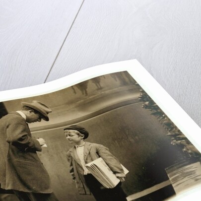 8 year old newsboy Michael McNelis, who'd just recovered from his second bout of pneumonia, selling papers in a rain storm by Lewis Wickes Hine